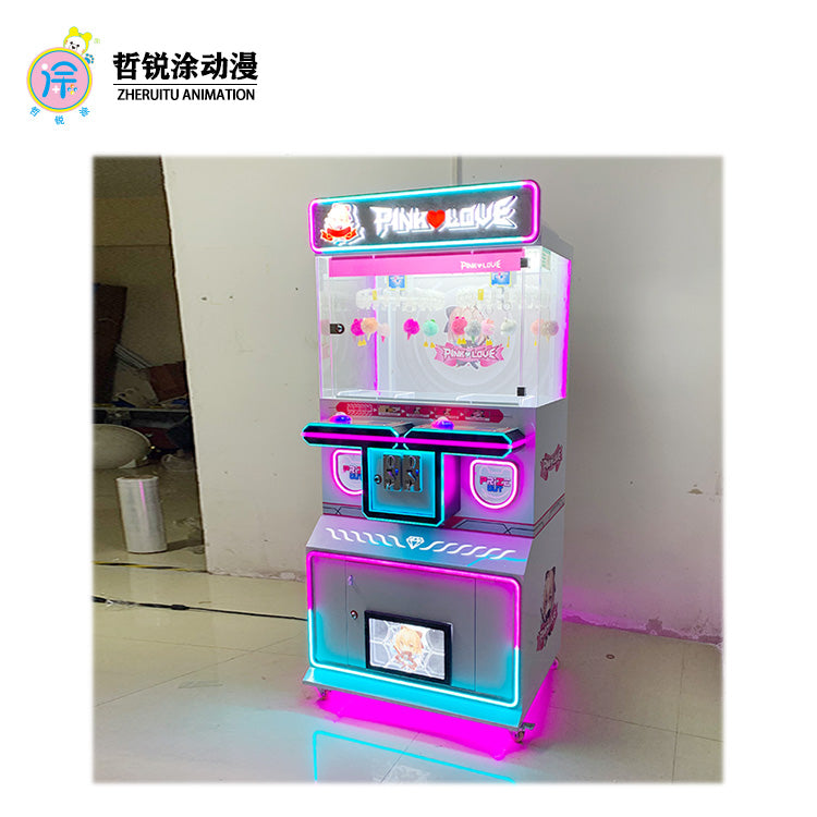 The two-person clip machine can hold toys snacks cards small gifts and is a coin-operated commercial amusement machine